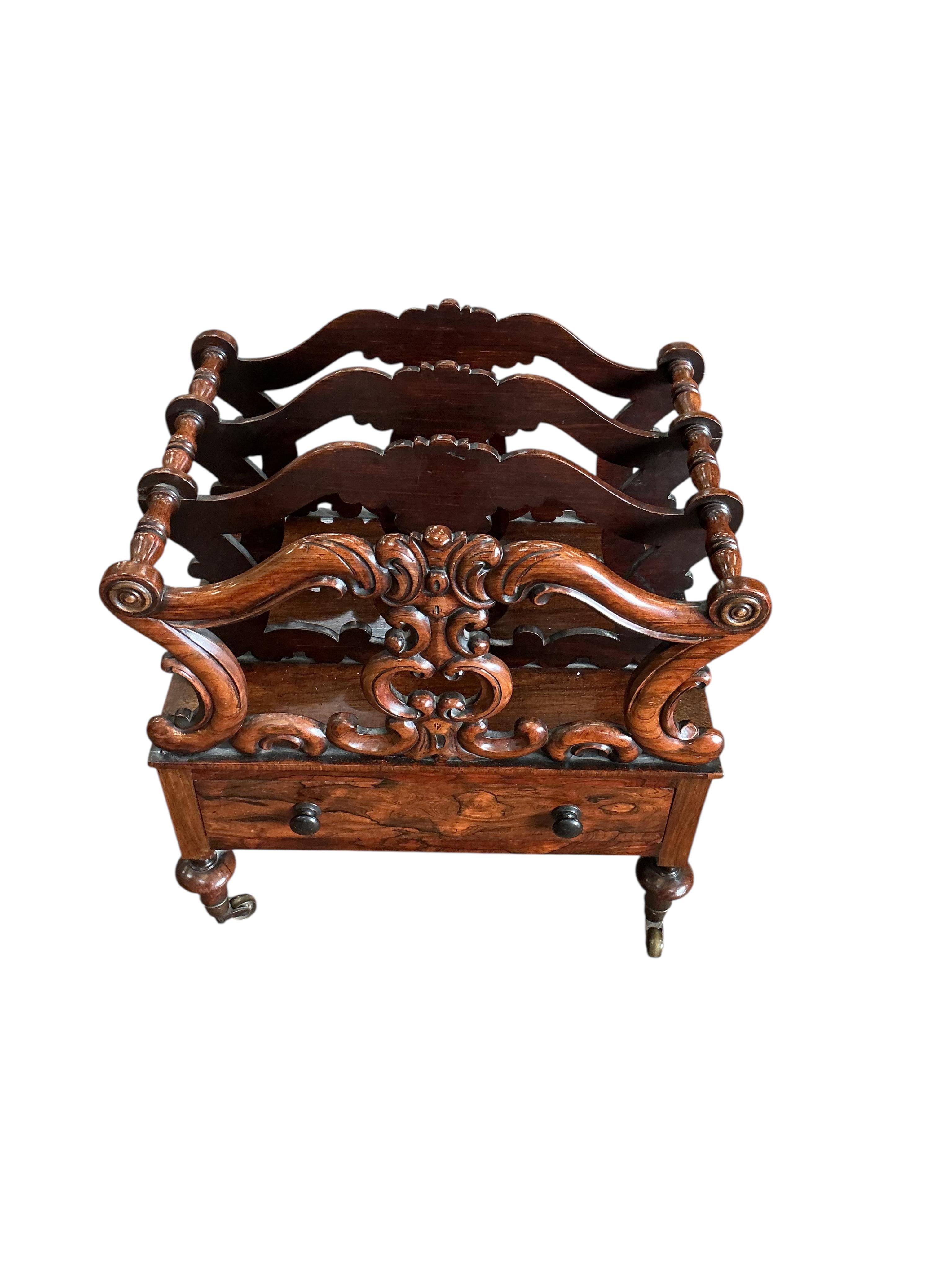 A Victorian rosewood three division Canterbury, width 56cm, depth 41cm, height 58cm